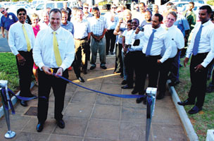 Johan Louw cuts the ribbon to open the new Yokogawa office in KZN.